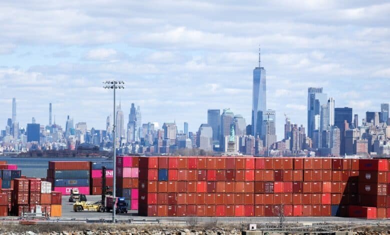 Photo: Shipping containers are seen in the Port Jersey container terminal, with the Manhattan horizon in the distance, in Jersey City, New Jersey, April 8, 2025.
